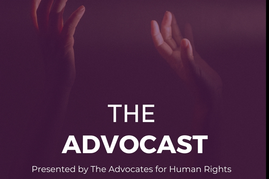 [ai] A graphic featuring raised hands against a dark background, with the text "THE ADVOCATE" in bold white letters. Beneath it, the subtitle reads, "Presented by The Advocates for Human Rights."