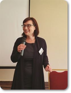 theresa_presenting_cmyk.jpg